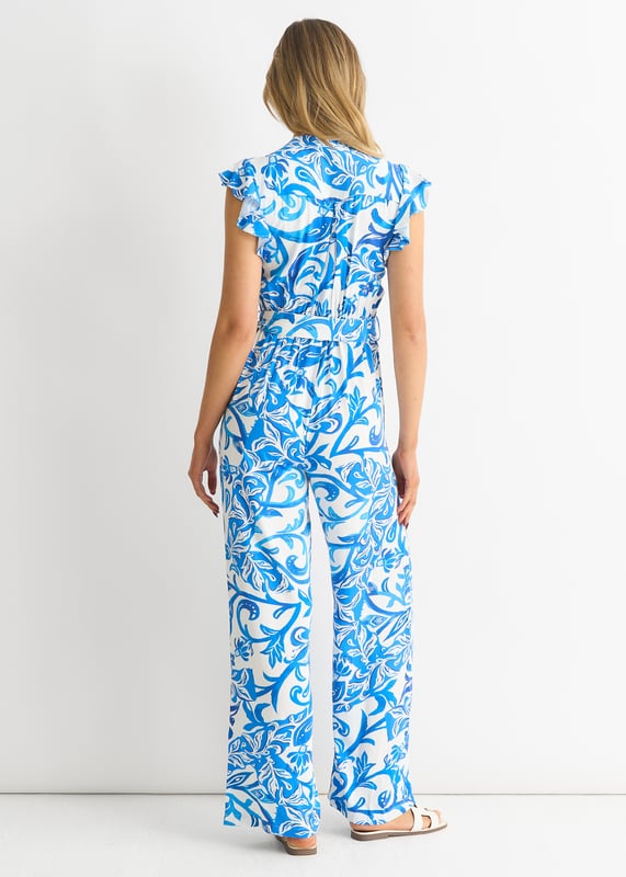 Elevate your style with our Blue Floral Ruffle Sleeves Jumpsuit. Featuring delicate ruffle sleeves and a stunning blue floral print, this jumpsuit is the perfect choice for any special occasion. Made with high quality materials, it's both comfortable and stylish. Make a statement and turn heads at your next event.