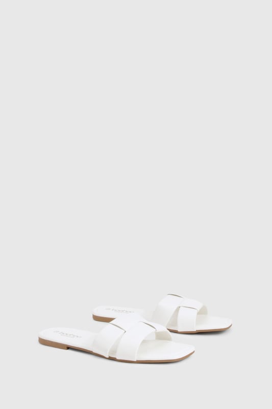 Woven Mule Sliders We'll make sure your shoes keep you one stylish step ahead of the crowdWhether you're keeping it simple in sliders, living the high life in heels or joining the fash pack in flatforms, you'll be heading to shoe heaven with our fashion-forward footwear collection. Boots are your day-to-night bestfriend, giving a floral dress that tough twist - add a biker jacket for even more attitude. Find your summer feet in jelly sandals and enjoy balmy nights in block heels.