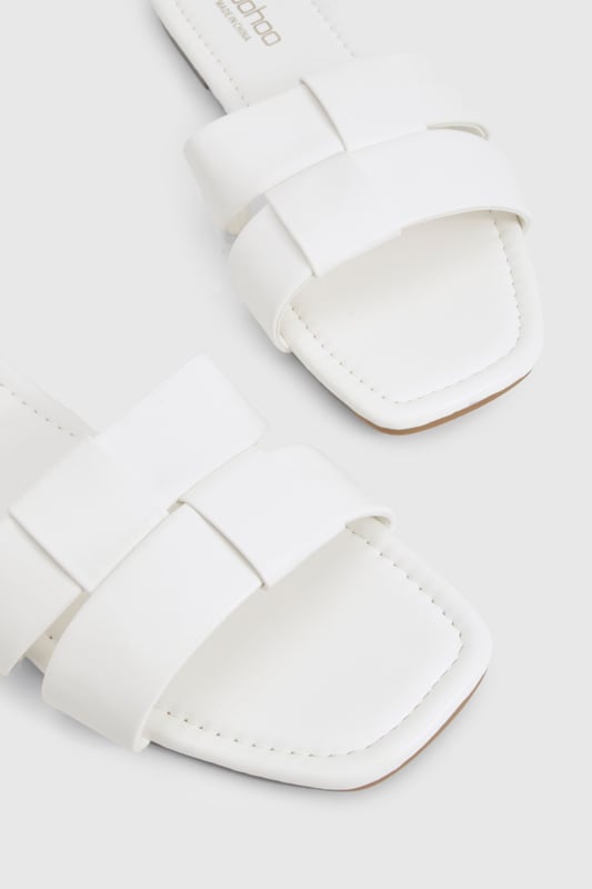 Woven Mule Sliders We'll make sure your shoes keep you one stylish step ahead of the crowdWhether you're keeping it simple in sliders, living the high life in heels or joining the fash pack in flatforms, you'll be heading to shoe heaven with our fashion-forward footwear collection. Boots are your day-to-night bestfriend, giving a floral dress that tough twist - add a biker jacket for even more attitude. Find your summer feet in jelly sandals and enjoy balmy nights in block heels.