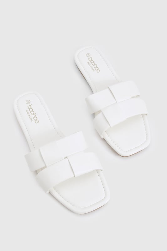 Woven Mule Sliders We'll make sure your shoes keep you one stylish step ahead of the crowdWhether you're keeping it simple in sliders, living the high life in heels or joining the fash pack in flatforms, you'll be heading to shoe heaven with our fashion-forward footwear collection. Boots are your day-to-night bestfriend, giving a floral dress that tough twist - add a biker jacket for even more attitude. Find your summer feet in jelly sandals and enjoy balmy nights in block heels.