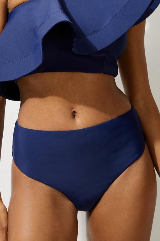 Welcome the sun with a bikini that will turn heads, the bottoms of which feature an ultra flattering high waisted design, and a high leg cut to elongate the legs. Style this piece with the matching top, as well as strappy sandals and a beach cover up for a holiday look that can be reworn time and time again. High Waist Bikini Bottom Cheeky Cut High Leg Design Flattering High Waisted Design Matching Top Sold Separately