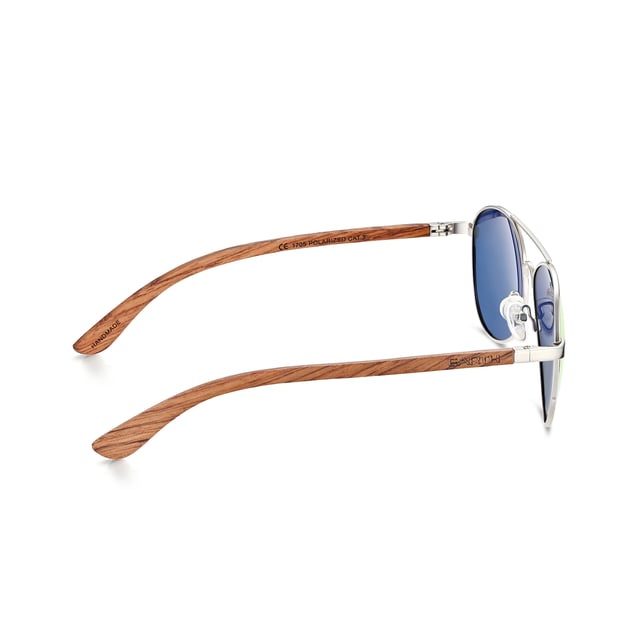 Earth Wood Sayulita Polarized Sunglasses - Redwood/Blue-Green Frame: Silver Metal ; Arm: Red Wood; Earpiece: Red Wood; Lens: Orange-Yellow Multi-Layer Triacetate Cellulose (TAC); Mirrored Lens: No; Gradient Lens: No; Polarization: Optical Quality; UV Protection: 100% UVA/UVB; Hinge: Spring Loaded Stainless Steel; Adjustable Nosepads: Yes; Lens Width: 60mm; Temple Length: 148mm; Bridge Width: 20mm.