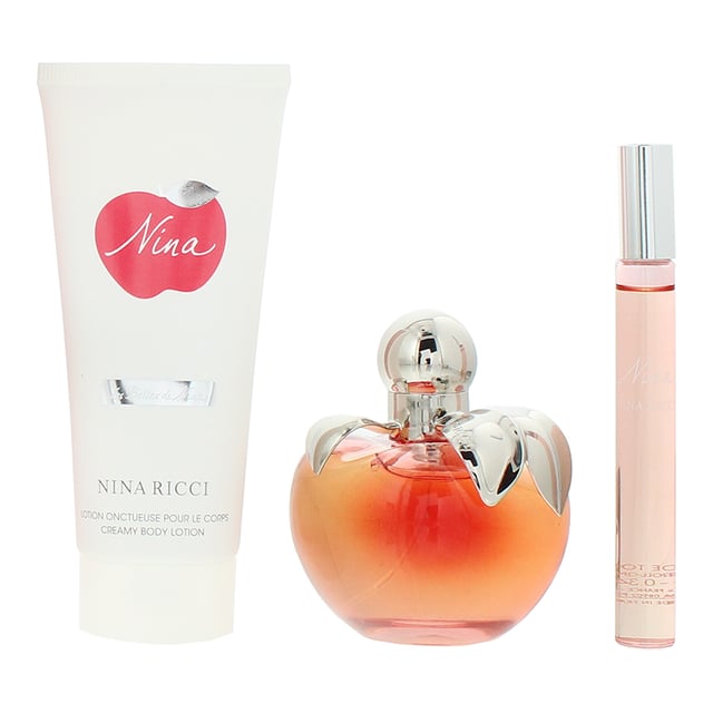 Launched in 2006 Nina, is a floral fruity fragrance for women, from Nina Ricci. The fragrance was created by the team of the team of Olivier Cresp, Jacques Cavallier and Christian Dussoulier, all three of whom are Master Perfumers, who worked together to replace the original Nina from 1987.
The fragrance has top notes of Amalfi Lemon and Lime; middle notes of Granny Smith Apple, Praline, Peony and Datura; and base notes of Apple Tree, Musk and Virginia Cedar. The fragrance is really built around the Apple note, which is fresh, crisp, sweet and slightly tart. The sweet qualities of the apple are amplified by the sweetness of the Praline making this very sweet, yet deliciously edible. As well as the candied apple like accord of the Praline and Apple, the fragrance also has some under-lying floral notes from the Peony and Datura notes. Due to the Fruitiness and the fresh nature of the fragrance, it is very much a Spring and Summer fragrance.
This gift set brings together the fragrance in an Eau De Toilette (50ml bottle) and a body lotion (75ml), which not only leaves skin smelling great but also feeling soft.
