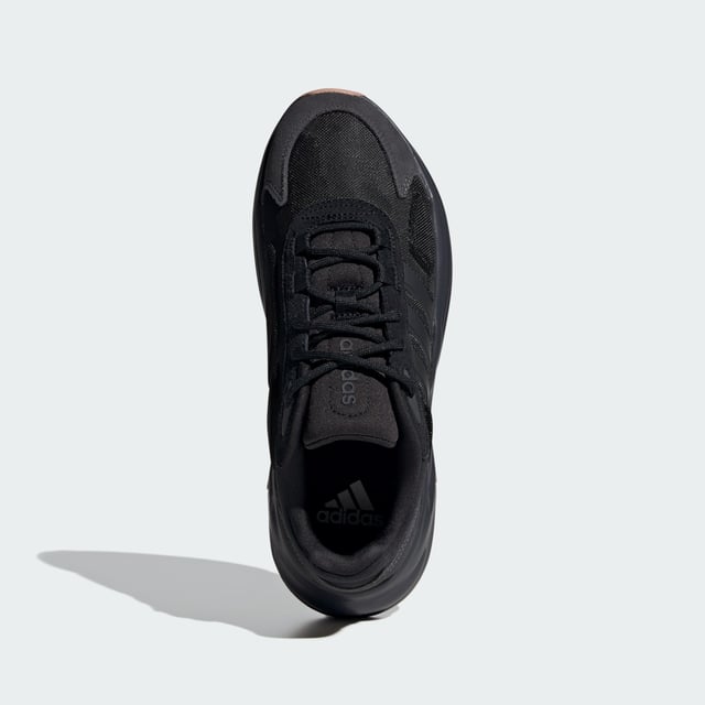 These old-school adidas running shoes get updated with a mix of lightweight materials and an of-the-moment chunky rubber outsole. And the inside is on point too, with Cloudfoam cushioning that feels comfy even when you're flat-out busy. 3-Stripes and low-key adidas graphics provide the finishing touches.  - Regular fit - Lace closure - Textile upper - Cloudfoam midsole - Textile lining - Rubber outsole - Upper contains a minimum of 50% recycled content  Shipped by adidas