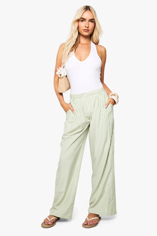 Stripe Wide Leg Trousers Trousers are a more sophisticated alternative to skinniesTrousers take on a realxed silhouette for the new season, with sports tailoring setting the trends and the wide leg one to watch. Pick printed palazzo pants for a dramatic day time look and tone down with a basic tee, or go for androgynous appeal in tapered man pants and wear with worn-in trainers for a trend-led twist.