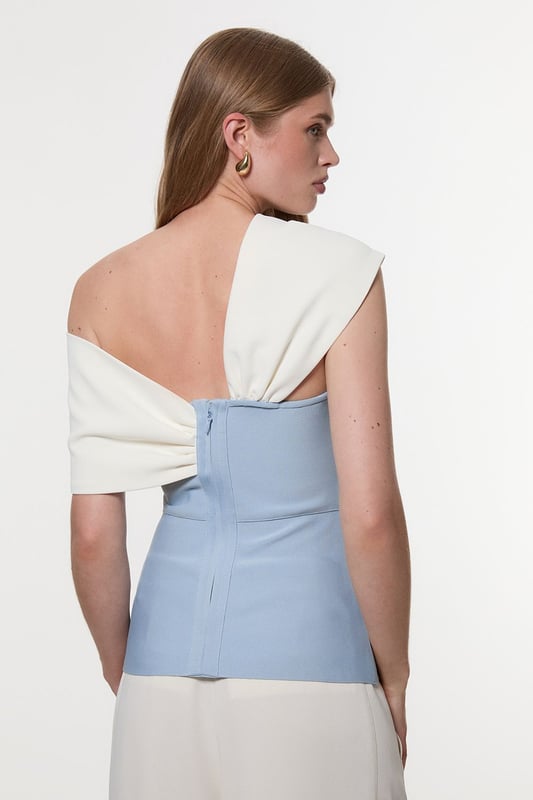 Figure Form Bandage Knit Asymmetric Strap Top Experience elegance in our top, with a fitted silhouette, and an asymmetric strap design, with one that sits off the shoulder and one on the shoulder. Style it with tailored trousers or jeans and strappy heels for an elevated evening look. Figure Form Bandage Knit Asymmetric Strap Top High Quality, Soft Knit Fabric Flattering Bodycon Fit Unique, Asymmetric Strap Detailing Zip Fastening in BackDiscover this seasons knitwear or browse the full collection of women's tops now.