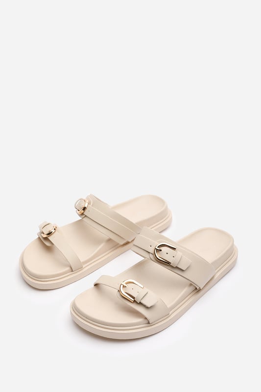 Wheres That From Womens 'Abril' Flatform Sandal With Double Buckle Strap Details Step into effortless style and comfort with these Abril Flatform Sandal with Double Buckle Strap Details. Designed for both casual and formal occasions, these sandals are the perfect addition to elevate your wardrobe, Perfect for those who love a blend of elegance and functionality. These elegant strappy heeled sandals are the perfect blend of sophistication and comfort. Key Features: • Durable Construction: Crafted with premium materials to withstand daily wear and tear. Sturdy sole with reinforced stitching for long-lasting quality. Scratch-resistant leather straps to maintain the look over time. • Chic Design: Sleek black finish with sophisticated metal buckle details. Strappy silhouette adds a modern and fashionable edge. Elevated platform sole for a subtle height boost. • Comfortable Fit: Soft cushioned insole ensures all-day comfort. Adjustable straps allow for a custom, secure fit. Lightweight design prevents fatigue during extended wear. Specifications: • Material: High-quality synthetic leather; • Closure Type: Slip on; Elevate your footwear collection with these Abril Flatform Sandal with Double Buckle Strap Details. Combining chic design, durable construction, and superior comfort, they are perfect for making a statement wherever you go!