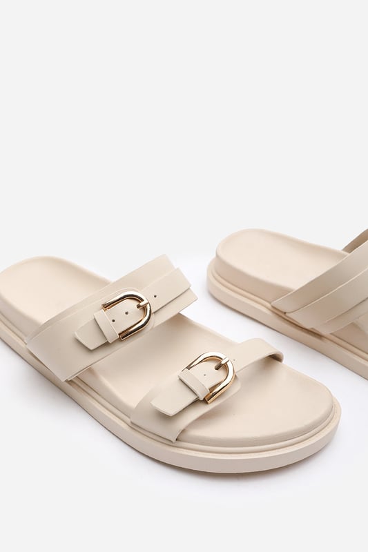 Wheres That From Womens 'Abril' Flatform Sandal With Double Buckle Strap Details Step into effortless style and comfort with these Abril Flatform Sandal with Double Buckle Strap Details. Designed for both casual and formal occasions, these sandals are the perfect addition to elevate your wardrobe, Perfect for those who love a blend of elegance and functionality. These elegant strappy heeled sandals are the perfect blend of sophistication and comfort. Key Features: • Durable Construction: Crafted with premium materials to withstand daily wear and tear. Sturdy sole with reinforced stitching for long-lasting quality. Scratch-resistant leather straps to maintain the look over time. • Chic Design: Sleek black finish with sophisticated metal buckle details. Strappy silhouette adds a modern and fashionable edge. Elevated platform sole for a subtle height boost. • Comfortable Fit: Soft cushioned insole ensures all-day comfort. Adjustable straps allow for a custom, secure fit. Lightweight design prevents fatigue during extended wear. Specifications: • Material: High-quality synthetic leather; • Closure Type: Slip on; Elevate your footwear collection with these Abril Flatform Sandal with Double Buckle Strap Details. Combining chic design, durable construction, and superior comfort, they are perfect for making a statement wherever you go!