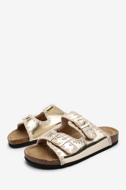 Wheres That From Womens 'Andi' Chunky Flatform Sandals With Cutout Straps Slide into effortless summer style with these Andi Chunky Flatform Sandals With Cutout Straps, crafted for comfort and standout design. Featuring bold contrast embroidery and dual adjustable buckle straps, they blend both charm with practicality. The cork-style footbed provides arch support, ideal for holidays, festivals, or casual city strolls. Key Features: • Material: Faux leather upper with a soft suede-effect footbed and cork midsole • Design: Dual-strap slide with decorative stitching and metallic buckles • Closure: Adjustable twin buckle straps for a secure and personalized fit