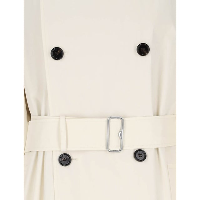 Gabardina de algodón Burberry - Composición: 100% Algodón - Mangas largas - Dos bolsillos laterales - Una abertura en la espalda - Cruzado - Cuello clásico - Bajo recto - Lavado a máquina (delicado) - Cinturón ajustable en la cintura - Tira de botones ajustable - Hecho en Italia - Género: MUJER -