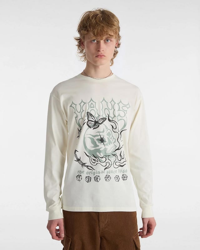 Add bold style to your everyday wardrobe with the Vans Lucky Streak Long Sleeve T-Shirt. Made from 100% soft cotton, this classic-fit tee features a crew neckline and eye-catching skeleton-inspired Vans logo artwork on the front. Designed for both comfort and edge, it’s perfect for adding a touch of statement graphics to your casual look. Key Features: Soft and breathable 100% cotton fabric Classic fit with a crew neckline Graphic Vans logo with skeleton imagery on the chest Long sleeves for versatile styling Style Code: VN000G4YFS8 Whether layered or worn on its own, this tee delivers signature Vans attitude with everyday comfort.
