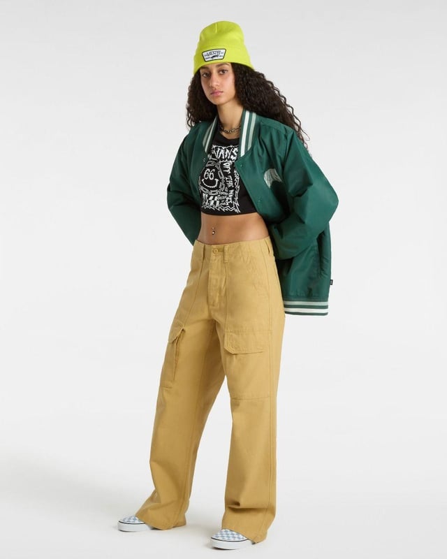 Add a playful edge to your casual wardrobe with the Vans Forever Checker T-Shirt. Made from soft 100% cotton, this short-sleeve tee features a classic crew neckline and eye-catching checkerboard-inspired graphic on the front. The cropped silhouette offers a trendy, laid-back vibe—perfect for pairing with high-waisted jeans, skirts, or shorts. Key Features: Soft and breathable 100% cotton fabric for all-day comfort Cropped length for a modern, youthful look Bold checkerboard-inspired graphic print on the front Classic crew neck and short sleeves for easy styling Ideal for everyday wear, from relaxed weekends to festival-ready fits A perfect blend of comfort and iconic Vans street style.