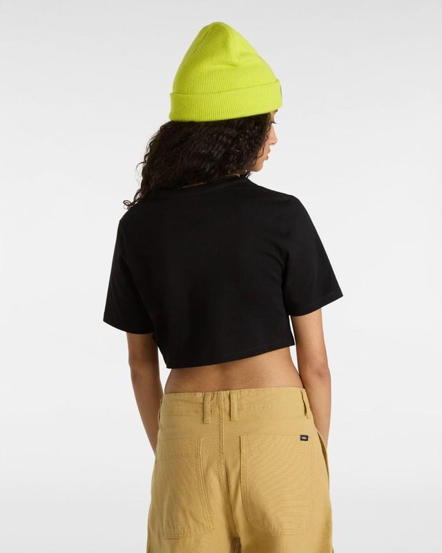 Add a playful edge to your casual wardrobe with the Vans Forever Checker T-Shirt. Made from soft 100% cotton, this short-sleeve tee features a classic crew neckline and eye-catching checkerboard-inspired graphic on the front. The cropped silhouette offers a trendy, laid-back vibe—perfect for pairing with high-waisted jeans, skirts, or shorts. Key Features: Soft and breathable 100% cotton fabric for all-day comfort Cropped length for a modern, youthful look Bold checkerboard-inspired graphic print on the front Classic crew neck and short sleeves for easy styling Ideal for everyday wear, from relaxed weekends to festival-ready fits A perfect blend of comfort and iconic Vans street style.