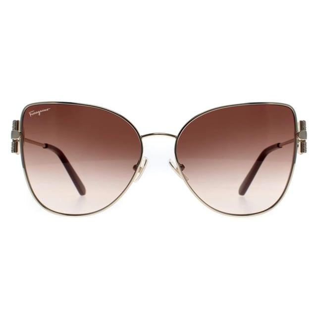 Salvatore Ferragamo Cat Eye Womens Gold Brown Gradient SF296SR  Sunglasses feature a bold design with a sleek frame. Offering excellent UV protection and comfort, theyâ€™re perfect for those who want both style and functionality.