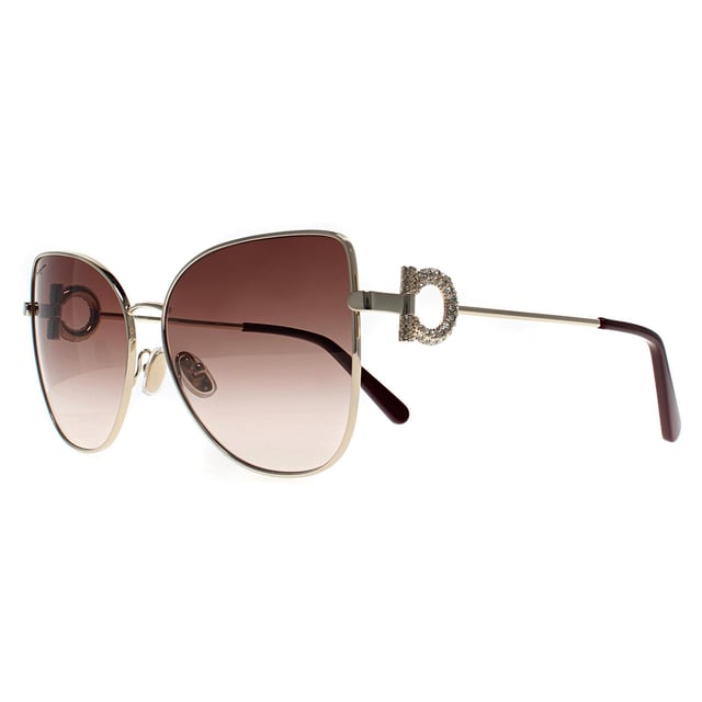 Salvatore Ferragamo Cat Eye Womens Gold Brown Gradient SF296SR  Sunglasses feature a bold design with a sleek frame. Offering excellent UV protection and comfort, theyâ€™re perfect for those who want both style and functionality.