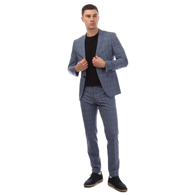 Men's Boss Reymond/Wenten Suit. Men's suit that includes jacket and pants from the creative team of Hugo Boss and the BOSS collection. The mini piqué fabric has a texture that creates an elegant pattern. The extra slim fit of the jacket and the pants follow the line of the body and shows it off. An all time classic suit, with modern aesthetics, that will complete your formal appearance. Material: 100% Virgin Wool. Ref: 50454432497.