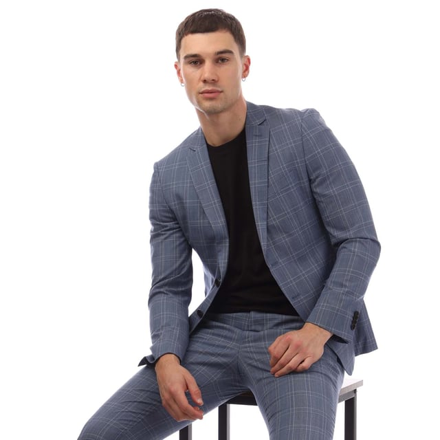 Men's Boss Reymond/Wenten Suit. Men's suit that includes jacket and pants from the creative team of Hugo Boss and the BOSS collection. The mini piqué fabric has a texture that creates an elegant pattern. The extra slim fit of the jacket and the pants follow the line of the body and shows it off. An all time classic suit, with modern aesthetics, that will complete your formal appearance. Material: 100% Virgin Wool. Ref: 50454432497.