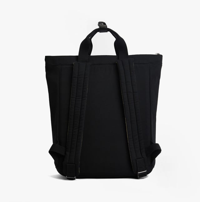 Barbour Olivia Womens Backpack Black This lightweight women's backpack features adjustable straps, a padded laptop sleeve, and a cotton exterior, ideal for casual use and daily organization