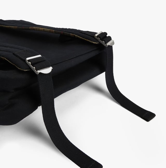 Barbour Olivia Womens Backpack Black This lightweight women's backpack features adjustable straps, a padded laptop sleeve, and a cotton exterior, ideal for casual use and daily organization