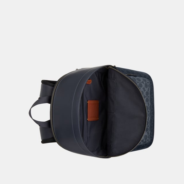 West Backpack in Blocked Signature Canvas Blocking West Backpack in Blocked Signature Canvas Blocking, Inside zip, cell phone and multifunction pockets, Outside zip pocket, Length: 32.00 cm, Width: 15.00 cm, Height: 42.50 cm