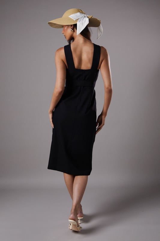 Lisa Tan Polo Cross Neck Belted Dress Distinctive cross-neck design creates an elegant silhouette
Statement square buckle belt detail accentuates the waist
Sophisticated side split adds movement and allure
Linen-blend fabric offers breathable comfort with structure
Midi length provides versatile styling options for various occasions
The Lisa Polo Cross Neck Belted Dress from Coast embodies refined elegance with its architectural neckline and striking belt detail. The cross-neck design frames the dcolletage beautifully, while the structured silhouette with a side split creates a graceful movement as you walk. Perfect for summer race days or garden weddings, this dress commands attention without overwhelming. Style with a wide-brimmed hat and delicate strappy sandals as shown for a quintessentially British summer event look. For evening soires, swap the hat for statement earrings and add metallic heeled sandals. The versatile midi length works wonderfully for both daytime formality and evening sophistication, making this a standout piece for your occasion wardrobe that transitions effortlessly from day to night.