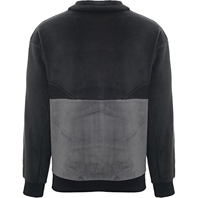 Main: 100% Polyester. This fleece is perfect for chilly days, serving as an extra layer under a jacket or cozy on its own. It features a zipped chest pocket and two hand pockets for convenience.