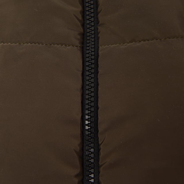 This item is made up of fabric that covers the neck.