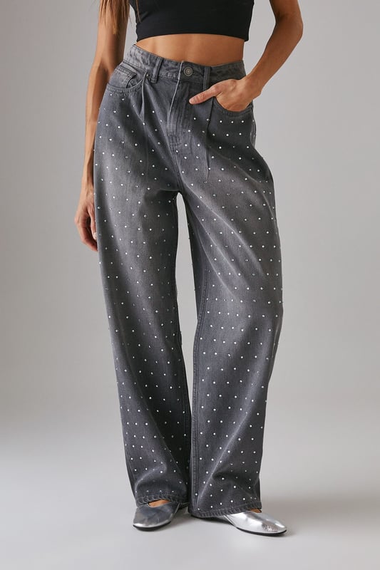 Relaxed boyfriend fit with a contemporary wide-leg silhouette
        Striking hotfix embellishments scattered across the denim for added sparkle
        Classic five-pocket design with functional front and back pockets
        High-rise waistband for a flattering and comfortable fit
        Traditional button and zip fastening for secure wear
    
    Make a statement with these Warehouse Hotfix Embellished Denim Boyfriend Jeans, where casual comfort meets eye-catching style. The relaxed boyfriend fit offers effortless wearability whilst the scattered embellishments add a touch of glamour to everyday denim. Style with a simple crop top and trainers for daytime outings, as seen on our model, or dress up with a fitted bodysuit and heeled boots for evening drinks. These versatile jeans transition seamlessly from family gatherings to casual brunches with friends. The high-rise waistband creates a flattering silhouette that works brilliantly with both tucked-in tops and shorter lengths. A true wardrobe hero that combines the timeless appeal of denim with contemporary detailing for the confident Warehouse woman.
