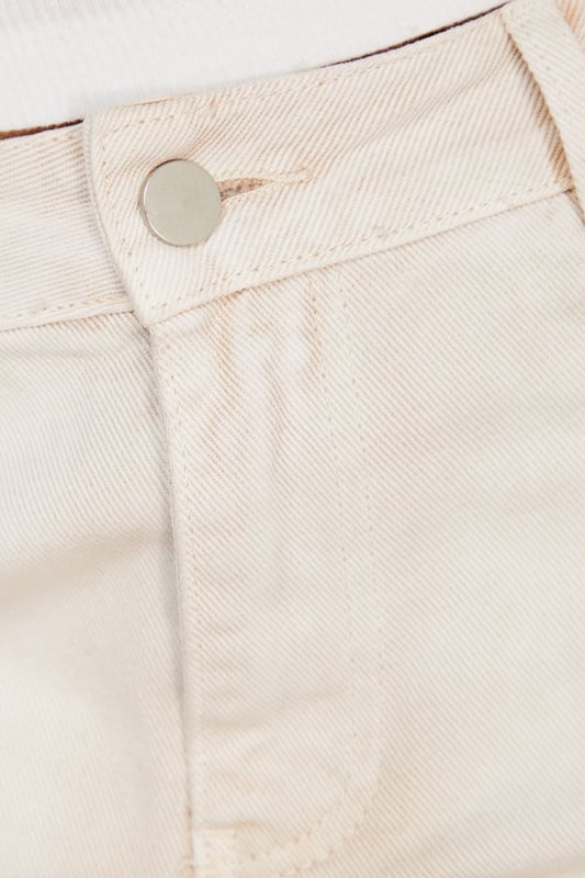 Relaxed dad jean silhouette with a contemporary ombre effect
        Wide-leg design offering maximum comfort and movement
        Classic five-pocket styling with traditional denim detailing
        High-rise waistband for a flattering and secure fit
        Crafted from 100% cotton for breathable, durable wear
    
    These Warehouse Ombre Denim Dad Jeans reflect the brand's confident, feminine aesthetic whilst delivering on everyday comfort. The relaxed silhouette creates an effortlessly cool vibe that works brilliantly with fitted tops to balance proportions. Style as seen with a simple crop top and western boots for an edgy daytime look, or dress up with a tucked-in silk blouse and statement jewellery for casual gatherings. The versatile ecru shade offers a fresh alternative to traditional denim, making these jeans perfect for spring through autumn wardrobes. Their relaxed fit allows for easy layering during cooler months - try with an oversized knit and trainers for weekend brunches or family gatherings. Machine washable for practical, fuss-free care.