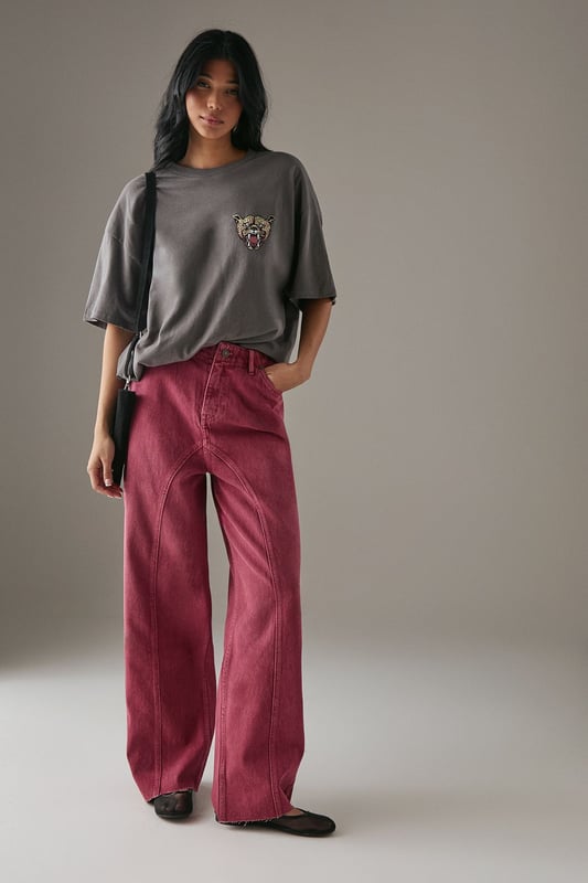 Distinctive raw waist seam detail creates a contemporary silhouette
        Relaxed dad jean fit offers exceptional comfort for all-day wear
        Washed denim finish gives these jeans a lived-in, authentic look
        Practical rear patch pockets add functionality to the design
        Wide leg shape with a subtle flare complements various body types
    
    These Warehouse dad jeans redefine casual cool with their distinctive seam detailing and relaxed silhouette. The washed denim construction offers both durability and comfort, making them perfect for your everyday rotation. Style them as seen with a crisp white t-shirt for an effortlessly chic look, or dress them up with a fitted blouse and ankle boots for evening drinks. The versatile wide-leg shape pairs brilliantly with chunky loafers for a nod to 90s nostalgia, or trainers for running weekend errands. These jeans shine at casual gatherings where comfort meets style - think Sunday brunches, shopping trips with friends, or relaxed family gatherings. Their timeless appeal and cotton composition ensure they'll remain a wardrobe staple for seasons to come, adapting seamlessly to your personal style journey.