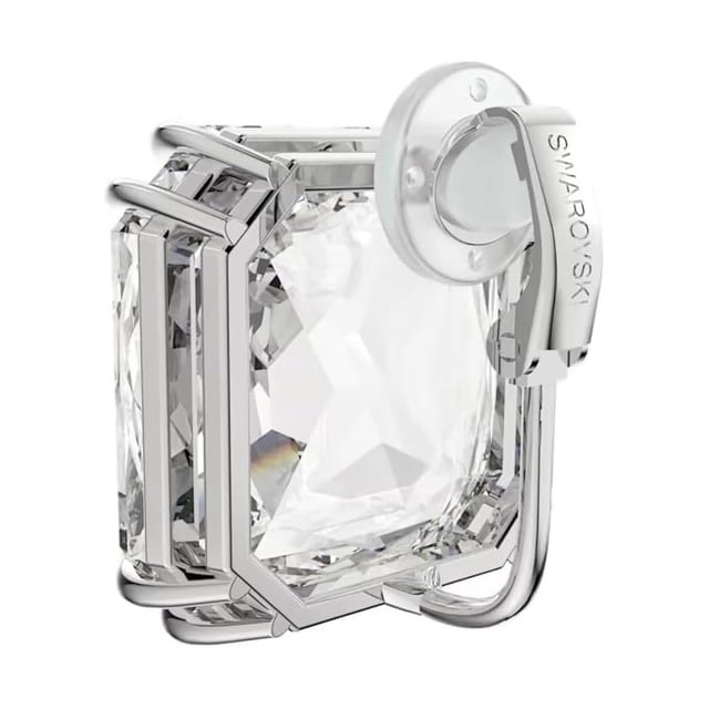 Der Mesmera Cry Square Einzelohrring 5600756 ist ein origineller transparenter Kristall-Ohrclip mit quadratischer Form.\n Wird einzeln verkauft und sein großer Kristall im Trillion-Schliff stiehlt die Show.\n Es kann alleine getragen oder mit anderen Designs für skurrile und lustige Kombinationen kombiniert werden!\n Designerin: Giovanna Engelber\n Maßnahmen: Abmessungen: 2,4 x 2,4 cm.\n Komposition: Kristall, rhodiniert\n Pflege:\nVermeiden Sie den Kontakt mit Cremes, Parfüms und Reinigungsmitteln, die das Produkt beschädigen könnten. Um den Glanz zu erhalten, empfehlen wir Ihnen, es nur mit einem weichen Tuch zu reinigen.