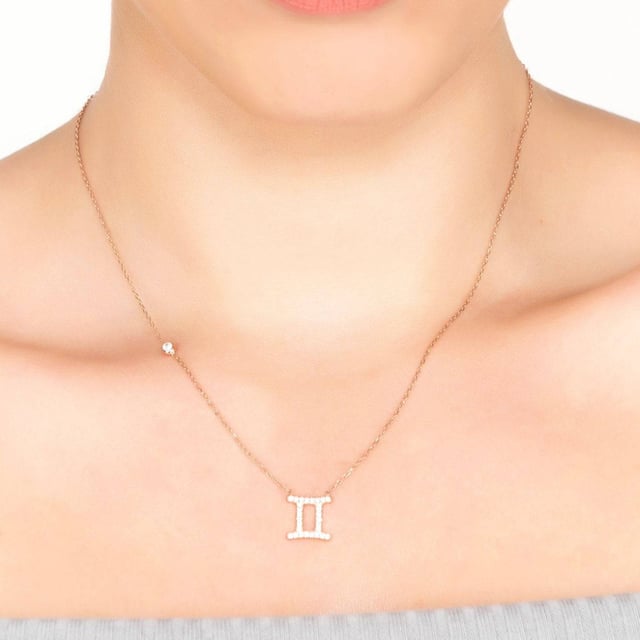 Gift yourself or your loved one a meaningful way to accessorize with style, the Zodiac Star Sign Pendant Necklace Silver.Made of 925 sterling silver, this necklace features a hand-set white zircon motif in the design of your zodiac sign symbol. Finished with a lobster clasp, this delicate and luxurious necklace is sure to become an accent piece you will reach for every day! The adjustable size allows you to fit it perfectly around your neck, it can be worn at 40 cm chain length or 45cm chain length. Plus, the weight is 2.6 grams, light enough to be comfortable while still making a statement!Geminis celebrate birthdays May 21 - June 20 and are known for their intelligence, wit, and adaptability. They enjoy learning new things, have an active mind and make excellent conversation partners. Geminis can be very sociable and outgoing but also independent when needed.No matter your sign, show off your knowledge  fashion sense and shine proudly with the Zodiac Star Sign Pendant Necklace Silver!
