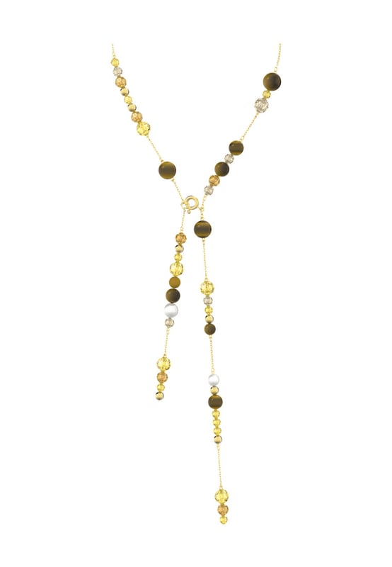 El collar Swarovski Somnia es una pieza de joyería excepcional que combina elegancia elegante y estilo boho chic moderno.\nCon su armoniosa mezcla de ojo de tigre, nácar y cristales en tonos tierra neutros, engastados en una capa de aleación de oro, este collar agregará un brillo especial a cualquier conjunto.\nPerfecto para superponer o como elemento destacado, este collar hace que cada conjunto sea único y radiante.\nJoya con baño de oro y cristales multicolores. Este collar está firmado por la directora creativa Giovanna Engelbert para la Colección II.\n Medidas: Longitud: 47cm\n Composición: Material: Cristales Swarovski, ojo de tigre, capa de aleación de oro.\n Cuidados:\nEvite el contacto con cremas, perfumes y detergentes que puedan dañar el producto. Para mantener el brillo, le recomendamos limpiarlo solo con un paño suave.