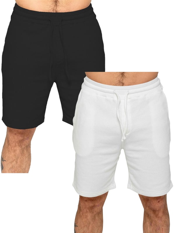 Experience ultimate comfort and style with our textured shorts. The elasticated waistband allows for a perfect fit with an adjustable drawstring. Convenient side pockets add functionality. Made with premium fabric for a luxurious feel. Pack of 2. (13)