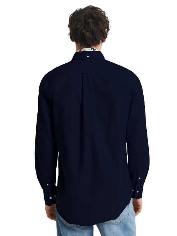 Introducing Enzo Milano Men's Shirts: the epitome of luxury. Impeccably crafted with lightweight, breathable cotton, these Regular Fit shirts feature a sophisticated Button-Down Collar and Long Sleeves for a timeless look. Each shirt is adorned with the Enzo Milano Logo, embroidered on the chest for a touch of exclusivity