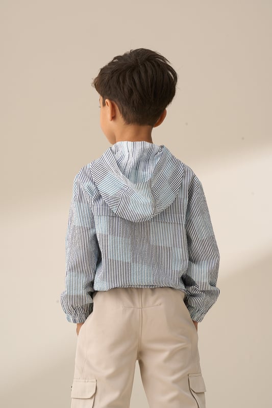 Earn your stripes! This hooded shirt features standout  -and-white stripes in a versatile. laid-back shape. Perfect for layering or wearing solo. it’s a cool and comfortable choice for any summer occasion.