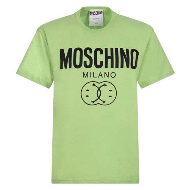 Moschino Milano Double Smiley Green T-shirt Elevate your casual wardrobe with the Moschino Milano Double Smiley Green T-Shirt, a vibrant piece that combines playful design with premium comfort. Crafted from soft, breathable fabric, this t-shirt features Moschino's iconic double smiley graphic in bold green, making it a standout choice for those who love to express their unique style. Perfect for pairing with jeans or layering under a jacket, it offers both versatility and a fresh pop of color. Embrace a fun, confident look that turns heads wherever you go with this must-have addition to your collection. Made in Portugal, 100% Cotton