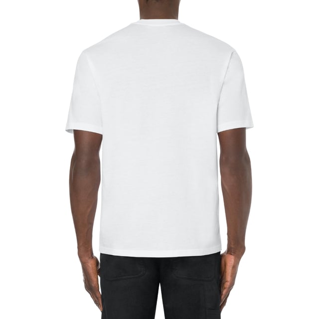 Elevate your casual wardrobe with the Moschino Milano Double Smiley Logo White T-Shirt. Crafted from premium, soft cotton, this tee offers exceptional comfort and breathability for all-day wear. Its crisp white fabric serves as the perfect backdrop for the iconic double smiley logo, making a bold, playful statement that captures Moschino's signature style. Whether paired with jeans or layered under a jacket, this versatile t-shirt adds a fresh, contemporary edge to any outfit. Embrace effortless fashion with a piece that combines quality, comfort, and standout design. Made in Portugal, 100% Cotton
