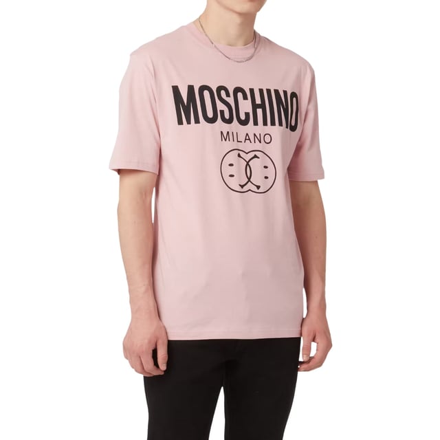 Elevate your casual wardrobe with the Moschino Milano Double Smiley Logo T-Shirt, a perfect blend of playful design and premium quality. Crafted from soft, breathable fabric, this t-shirt ensures all-day comfort while showcasing Moschino's iconic double smiley logo for a bold, stylish statement. Its versatile fit makes it ideal for layering or wearing solo, effortlessly enhancing your look whether you're out with friends or enjoying a relaxed day. Make a confident impression with this standout piece that combines fun and fashion in one must-have tee. Made in Portugal, 100% Cotton