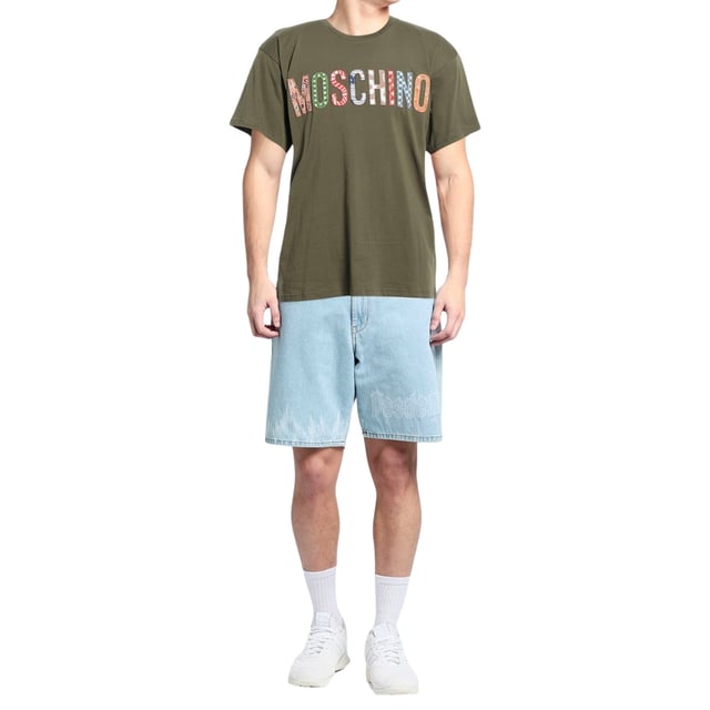 Moschino Bold Embroidered Multicolour Logo Green T-shirt Elevate your casual wardrobe with the Moschino Bold Embroidered Multi Logo Green T-Shirt. Crafted with attention to detail, this vibrant green tee features striking multi-logo embroidery that showcases Moschino's iconic style. Made from high-quality materials, it offers a comfortable fit perfect for everyday wear or making a statement at social gatherings. The bold design adds a fresh, contemporary edge to your outfit, ensuring you stand out effortlessly. Ideal for fashion enthusiasts who appreciate unique, standout pieces, this T-shirt combines comfort and luxury in one versatile garment. Make it a key part of your collection today. Made in Portugal, 100% Cotton