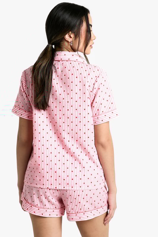 Heart Stripe Shirt & Short Pyjama Set Take nights in up a notch with our silky soft sleepwearYou'll be saying no to nights out when you see our snuggle-worthy sleepwear and luxe loungewear. Cosy up in a co-ordinating pyjama set, drift off in a night dress or go for slumber party success in a statement onesie. Catch your beauty sleep in the best basics from boohoo.