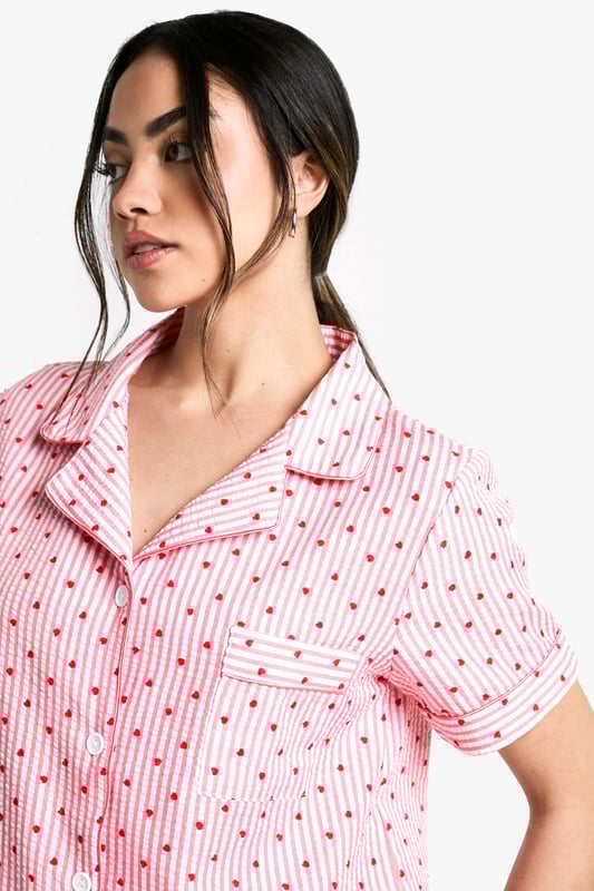 Heart Stripe Shirt & Short Pyjama Set Take nights in up a notch with our silky soft sleepwearYou'll be saying no to nights out when you see our snuggle-worthy sleepwear and luxe loungewear. Cosy up in a co-ordinating pyjama set, drift off in a night dress or go for slumber party success in a statement onesie. Catch your beauty sleep in the best basics from boohoo.