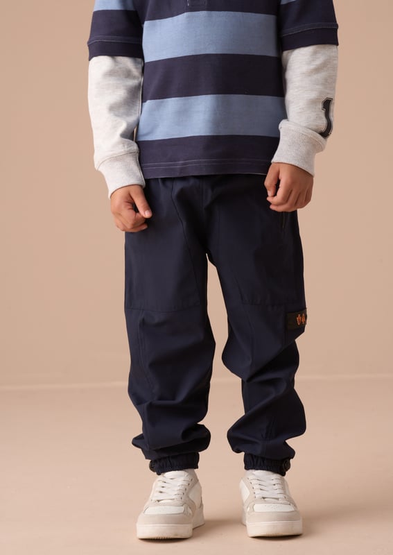 Introducing our new tech cargo jogger. a perfect wardrobe update. Cut to a relaxed fit with pockets at the side and elasticated drawstring waist and cuff. These joggers have you covered for any adventure!.