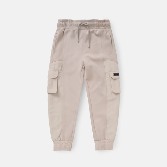 Refresh your everyday edit with these joggers! Featuring mixed fabrication and panelled cargo pockets. they combine a clean. streamlined look with a sports luxe vibe.