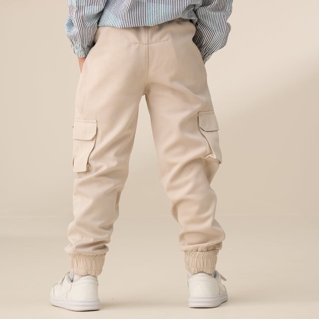 Refresh your everyday edit with these joggers! Featuring mixed fabrication and panelled cargo pockets. they combine a clean. streamlined look with a sports luxe vibe.