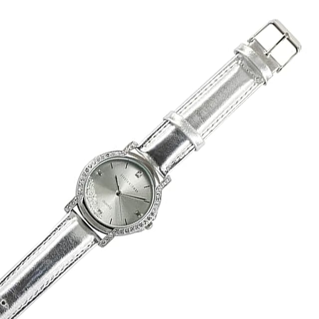Devota & Lomba California Silver Watch: brilliant elegance with an urban soul.\n\n Designed for women who value refined style with modern touches, this watch dazzles with its metallic finish and the subtle dance of Swarovski crystals on its dial. A functional accessory with a sophisticated attitude.\n\n Details:\n - 30mm round steel case, surrounded by Swarovski crystals.\n - Minimalist dial with Swarovski crystals inside.\n - Japanese quartz movement PC32.\n - Genuine leather strap with silver metallic finish.\n - Water resistant up to 5 ATM.\n\n A feminine, functional, and characterful watch, perfect for elevating any look with a touch of sophistication.\n Measures: 35 mm\n Composition: Skin, Metal\n Care:\nAvoid contact with perfumes, creams or chemicals.