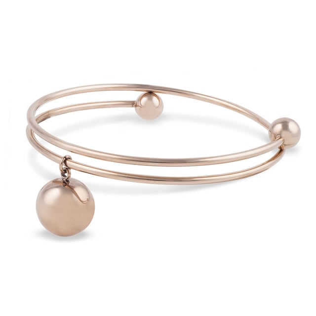 Budapest Bracelet: Geometric sophistication in rose gold.\n\n This double-ring bracelet stands out for its clean, contemporary design, featuring a dangling sphere that adds movement and style. Crafted from steel and rhodium-plated with a rose gold finish, it combines elegance and durability for everyday wear with a modern touch.\n\n Details:\n - Made of high quality steel, firm and light.\n - Rhodium plating with a rose gold finish, offering a warm and sophisticated shine.\n - Open design with double-ring structure, easy to put on.\n - Decorative detail with hanging sphere and rounded ends.\n - Minimalist style with a modern twist, ideal for urban or elegant looks.\n\n A versatile and striking women's bracelet that adds character without sacrificing simplicity. Perfect for those looking for designer pieces with a refined finish.\n Measures: Diameter: 6.4 cm\n Composition: Stainless steel, rhodium plating\n Care:\nAvoid contact with perfumes and abrasive products.