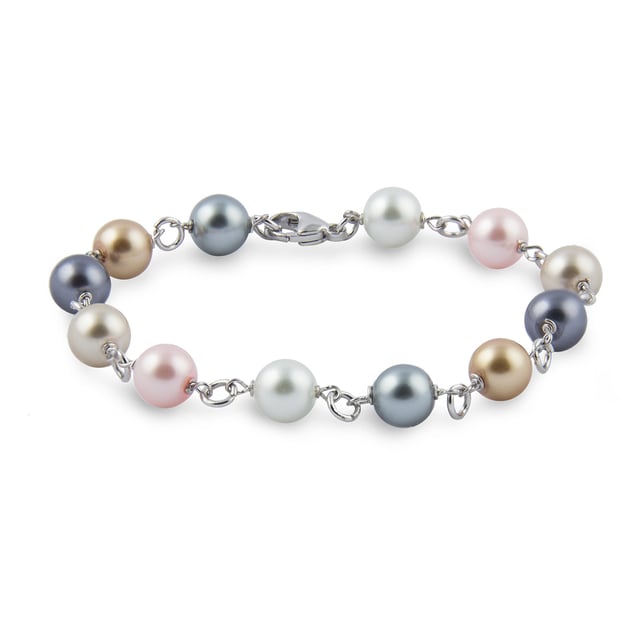 Pollença Bracelet with Majorcan Pearls: color and elegance with artisanal tradition.\n\n This bracelet celebrates variety and balance, combining Mallorcan pearls in multiple hues with a classic metal link design. Lightweight, lively, and refined, it's perfect for adding a special touch to any look.\n\n Details:\n - Handcrafted in Mallorca using the traditional method.\n - Majorcan pearls with a shiny finish and polished texture.\n - Varied shades that provide dynamism and sophistication.\n - Threaded with metal links that provide structure and movement.\n - Secure and easy-to-attach lobster clasp.\n\n A vibrant and versatile piece of jewelry, ideal for those who enjoy handcrafted details and are looking for an accessory that goes with everything.\n Measures: Length: 21 cm\n Composition: Pearls, Metal\n Care:\nAvoid contact with perfumes, creams and chemicals.