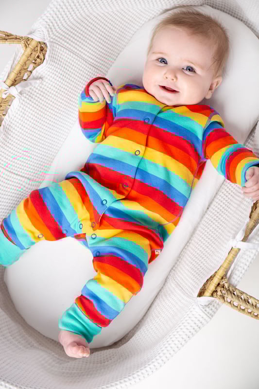 Long sleeve baby romper with centre front popper fastening and turn down leg cuffs for extended wear.GOTS Organic Certified by Soil Association Certification Licence Number DK22283