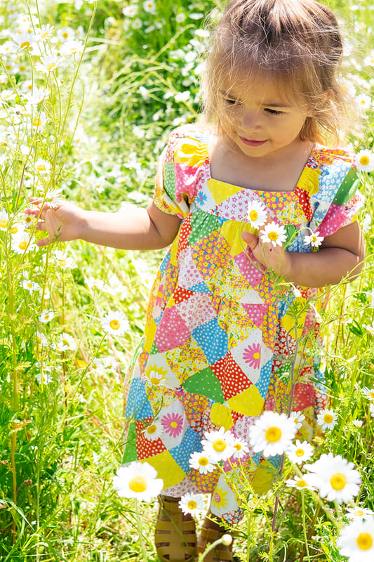 Short sleeved tiered dress made from Organic Cotton Poplin. Features soft elasticated gathered cuff.GOTS Organic Certified by Soil Association Certification Licence Number DK22283